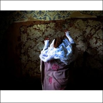 Image linking to About this Project page, image of artwork 'Hands on the Wall' by Emiko Artemis, copyright Emiko Artemis